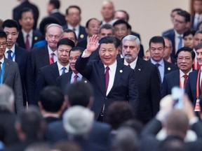 China's President Xi Jinping (C) arrives with leaders at the opening ceremony of the "CPC in dialogue with world political parties" high-level meeting, at the Great Hall of the People in Beijing, China December 1, 2017.