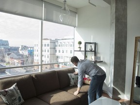 Kevin Makra is pictured preparing for guests in his Toronto Airbnb rental apartment, on Saturday, December 2, 2017. Politicians in Toronto will be scrutinizing proposed rules for short-term rentals this week that could spell major changes for those who offer secondary residences for rent on platforms like Airbnb.