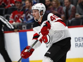 New Jersey Devils defenseman Sami Vatanen passes the puck against the Colorado Avalanche in the first period of an NHL hockey game Friday, Dec. 1, 2017, in Denver.