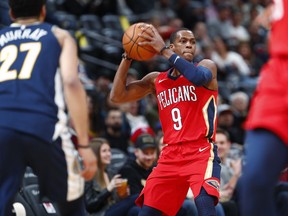 New Orleans Pelicans guard Rajon Rondo, right, looks to pass the ball as Denver Nuggets guard Jamal Murray defends in the first half of an NBA basketball game Friday, Dec. 15, 2017, in Denver.