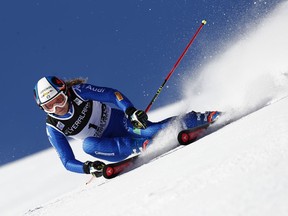 Italy's Manuela Moelgg competes during an alpine ski, women's World Cup giant slalom in Courchevel, France, Tuesday, Dec. 19, 2017.