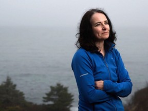 Municipal officials in Halifax will offer an apology today to a former firefighter who waged a 12-year battle against what she says was "systemic" gender discrimination. Liane Tessier is pictured near her Duncan's Cove, N.S., home Thursday, May 5, 2016. Tessier said last week that a settlement was reached with the city after years of complaints about abusive and disrespectful behaviour from her male counterparts.