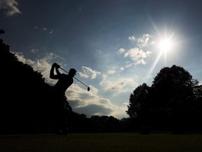 Dustin Johnson tees off on the thirteenth hole during the 2017 Canadian Open at the Glen Abbey Golf Club, in Oakville, Ont., on Thursday, July 27, 2017. For anyone unfamiliar with the game, buying a gift for a golfer can be a stressful and intimidating ordeal ??? so much so that many people won???t bother, reasoning that the links-obsessed loved one in question can just get what they want themselves.THE CANADIAN PRESS/Nathan Denette