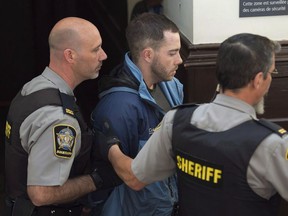 Christopher Calvin Garnier arrives at provincial court in Halifax on Thursday, Sept. 17, 2015. Garnier has taken the stand at his trial in the death of off-duty police officer Catherine Campbell.