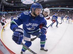 Vancouver Canucks forward Alexander Burmistrov is retiring from the NHL and will continue his career in the Kontinental Hockey League, his agent says. Vancouver Canucks' Alexander Burmistrov, front, of Russia, grabs New Jersey Devils' Jimmy Hayes' stick as he's checked during the first period of an NHL hockey game in Vancouver, B.C., on Wednesday November 1, 2017.