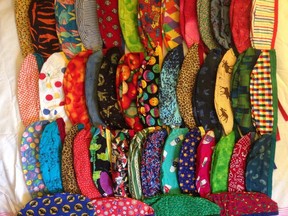 A collection of brightly coloured cloth caps are seen in this undated handout photo. Retired anesthetist Dr. Glenn Gibson believes he was an early trendsetter in slipping on brightly coloured cloth caps before heading into the operating room.