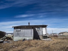 The house is hwon in the northern Ontario First Nations reserve of Attawapiskat, Ont., on Wednesday, April 20, 2016. The parliamentary budget officer estimates it will cost a minimum of $3.2 billion in capital investment to bring First Nations water systems up to standards seen in comparable non-Indigenous communities and eliminate boil-water advisories by 2020.
