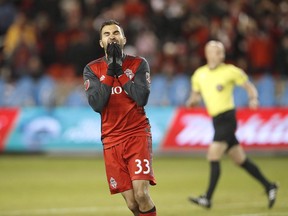 Toronto FC defender Steven Beitashour (33) reacts after his shot missed the net during second half MLS Cup Final soccer action against the Seattle Sounders in Toronto on December 9, 2017. Steven Beitashour, Drew Moor, Armando Cooper and Benoit Cheyrou, who all saw action for Toronto FC in Saturday's MLS Cup final win over Seattle, have been left unprotected in the MLS expansion draft.Beitashour and Moor, along with fellow unprotected TFC defender Jason Hernandez are all free agents.