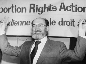 Dr. Henry Morgentaler raises his arms in victory at a news conference in Toronto, Ont., Jan. 28, 1988. This January marks 30 years since the Supreme Court of Canada struck down the country's abortion law as unconstitutional.THE CANADIAN PRESS/Blaise Edwards