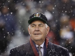 The U.S. Secretary of State will be meeting with a committee of the Canadian federal cabinet when he visits Ottawa next week. U.S. Secretary of State Rex Tillerson waits for the coin toss ahead of an NCAA college football game between the Army and the Navy, in Philadelphia on Saturday, Dec. 9, 2017.