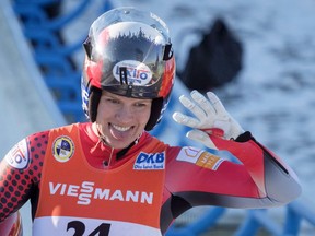 Canada's Alex Gough, celebrates her second place finish in the women's World Cup luge competition in Calgary on December 9, 2017. Alex Gough of Calgary leads Canada's eight lugers into the 2018 Winter Games in Pyeongchang, South Korea, where the country seeks its first Olympic medal in the sport.Gough is Canada's most decorated luge athlete with 25 World Cup medals two world championship bronze in women's singles.
