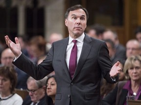 Minister of Finance Bill Morneau responds to a question during Question Period in the House of Commons Thursday Nov.30, 2017 in Ottawa. It was the week the Conservatives finally called on Bill Morneau to resign, to no avail.