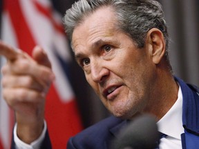 Manitoba Premier Brian Pallister speaks to media at an embargoed press conference before the provincial throne speech at the Manitoba Legislature in Winnipeg, Tuesday, November 21, 2017.