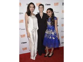 Angelina Jolie, from left, director Nora Twomey and Saara Chaudry attend a premiere for "The Breadwinner" at the Toronto International Film Festival on Sunday, Sept. 10, 2017, in Toronto.