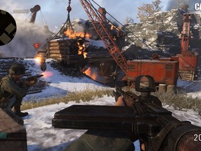 A scene from an online multiplayer game of "Call of Duty: WW2" is shown in this undated handout photo. MacKenzie Bates helped create the multiplayer mode of "Call of Duty: WW2." So the 24-year-old Sledgehammer Games developer knows how to play the latest instalment of the hit video game franchise. But Bates says within hours of the game's release, he was getting "crushed" by gamers online. "They just picked it up and they're so much better at it," he said. THE CANADIAN PRESS/HO - Activision