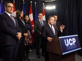 UCP Leader Jason Kenney, centre, stands with his leadership team, from left, Jason Nixon, Angela Pitt, Leela Aheer, Ric McIver and Prab Gill, in Edmonton Alta, on Monday, October 30, 2017.