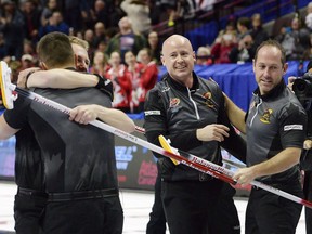 Team Koe lead Ben Hebert, left to right, third Marc Kennedy, skip Kevin Koe and second Brent Laing celebrate their win over Team McEwen during the men's final at the 2017 Roar of the Rings Olympic Curling Trials in Ottawa on Sunday, December 10, 2017. Hebert and Kennedy are back curling in the Olympic Games with another skip named Kevin. Eight years after winning gold with Kevin Martin in Vancouver, they'll head to Pyeongchang with skip Kevin Koe. Experience helps, but Hebert says it will be a "heck of a lot tougher" to win gold than in 2010.
