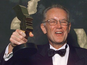 Bruce Gray holds up his Gemini Award for best performance by an actor in a continuing dramatic program, March 1, 1998, for his role in "Traders" in Toronto. Canadian actor Bruce Gray, who was a prolific presence on the stage and screen with roles including an investment banker on the series "Traders" and the hapless father of the groom in the film "My Big Fat Greek Wedding," has died.