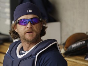 Milwaukee Brewers catcher Gregg Zaun talks in the dugout before a spring training baseball game against the Seattle Mariners in Phoenix on Monday, March 8, 2010. The sudden flameout of Sportsnet broadcaster Gregg Zaun caps a controversy-laced career for one of television's most outlandish personalities.