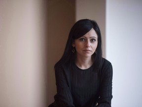 Jilian Derksen sits for a portrait in her home in Kitchener, Ont., on Thursday, April 6, 2017. Newly approved changes to the Canada Pension Plan will mean widows and widowers, regardless of age, will receive full survivor benefits, changing five decades of federal policy.THE CANADIAN PRESS/Hannah Yoon