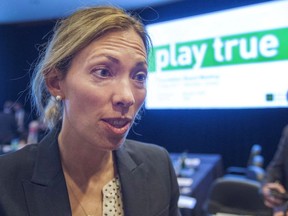 Former Canadian Olympic gold medal winner and currently World Anti-Doping Agency athletes committee member Beckie Scott speaks to reporters after the agency's Foundation Board meeting Thursday, May 18, 2017 in Montreal. Scott says she's encouraged by the International Olympic Committee's decision to ban Russia from the 2018 Winter Olympics and allow only clean athletes from that country to compete as neutrals.