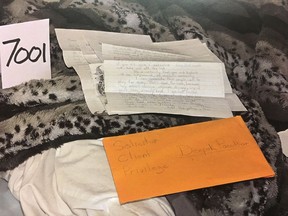 Envelopes found with letters written by Dellen Millard from jail to his girlfriend, Christina Noudga, is shown in this undated police handout photo.