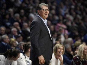 Connecticut head coach Geno Auriemma smiles during the first half an NCAA college basketball game against Oklahoma, Tuesday, Dec. 19, 2017, in Uncasville, Conn.