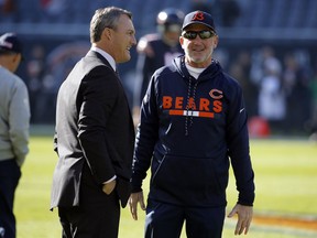 San Francisco 49ers general manager John Lynch, left, talks to Chicago Bears head coach John Fox before an NFL football game, Sunday, Dec. 3, 2017, in Chicago.