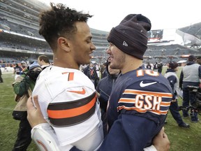 Cleveland Browns quarterback DeShone Kizer, left, and Chicago Bears quarterback Mitchell Trubisky (10) talk after an NFL football game in Chicago, Sunday, Dec. 24, 2017. Chicago won 20-3.