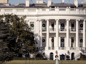 A large portion of a famed Magnolia tree, at left, photographed from the Ellipse in Washington, Tuesday, Dec. 26, 2017 and planted on the south grounds of the White House by President Andrew Jackson in 1835 has become too weak to remain standing. Removal is planned for this week while President Donald Trump and his family are away for the holidays.