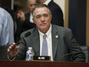Rep. Trent Franks, R-Ariz., takes his seat before the start of a House Judiciary hearing on Capitol Hill in Washington, Thursday, Dec. 7, 2017, on Oversight of the Federal Bureau of Investigation. Franks says in a statement that he never physically intimidated, coerced or attempted to have any sexual contact with any member of his congressional staff. Instead, he says, the dispute resulted from a discussion of surrogacy. Franks and his wife have 3-year-old twins who were conceived through surrogacy.