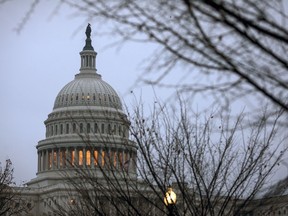 The Capitol is seen in Washington, early Tuesday, Dec. 5, 2017, days before a budget clash could produce a partial government shutdown by the weekend unless there's an agreement on a measure temporarily keeping agencies open. President Donald Trump and congressional leaders have scheduled a meeting to sort out their differences over spending, immigration and other priorities.