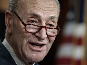 Senate Minority Leader Chuck Schumer, D-N.Y., holds a news conference to talk about the Democratic victory in the Alabama special election and to discuss the Republican tax bill, on Capitol Hill in Washington, Wednesday, Dec. 13, 2017.