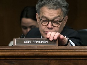 Sen. Al Franken, D-Minn., who said last week he'll step down in the coming weeks due to mounting allegations of sexual misconduct, attends a hearing of the Senate Health, Education, Labor, and Pensions Committee, on Capitol Hill in Washington, Tuesday, Dec. 12, 2017.