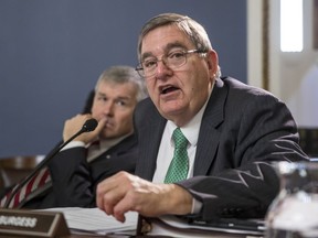 Health Subcommittee Chairman Michael C. Burgess, R-Texas, joined at left by Rep. Rob Woodall, R-Ga., speaks about funding for the CHIP program as the House Rules Committee meets to work on a government funding bill, on Capitol Hill, in Washington, Thursday, Dec. 21, 2017. With a government shutdown clock ticking toward a midnight Friday deadline, House Republican leaders struggled on Wednesday to unite the GOP rank and file behind a must-pass temporary spending bill.