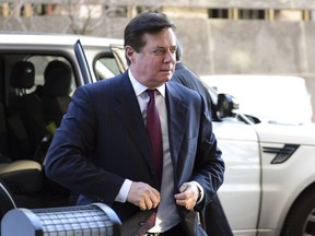Former Trump campaign chairman Paul Manafort arrives at federal court in Washington, Monday, Dec. 11, 2017.