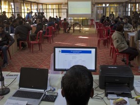 An election official using a computer for vote counting at a poll counting center in Dharmsala, India, Monday, Dec. 18, 2017. Voting for local elections in this northern Indian state of Himachal Pradesh was held on Nov. 9.
