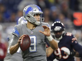 Detroit Lions quarterback Matthew Stafford looks downfield during the first half of an NFL football game against the Chicago Bears, Saturday, Dec. 16, 2017, in Detroit.