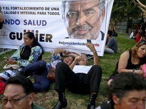 Supporters of presidential candidate Alejandro Guillier take a selfie during his closing campaign rally in Santiago, Chile, Thursday, Dec. 14, 2017. Guillier will face former President Sebastian Pinera in the Dec. 17 presidential election runoff.