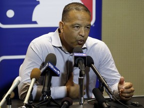 Los Angeles Dodgers manager Dave Roberts talks with members of the media at the MLB baseball winter meetings Tuesday, Dec. 12, 2017, in Orlando, Fla.