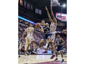 Charleston Southern forward Travis McConico drives the lane in the first half of an NCAA basketball game against Florida State in Tallahassee, Fla., Monday, Dec. 18, 2017.