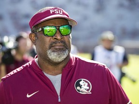 Florida State interim head coach Odell Haggins watches the team warm up before an NCAA college football game Louisiana Monreo in Tallahassee, Fla., Saturday, Dec. 2, 2017. Haggins took over the head coaching duties for Florida State's last football game after Jimbo Fisher left to be the head coach at Texas A&M.