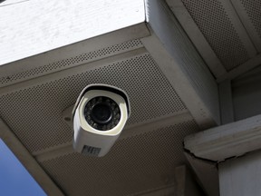A surveillance camera installed on the Southeast Seminole Heights house of Patrick and Kelly Halladay is seen on Monday, Dec. 18, 2017 in Tampa, Fla.  This is one of the four surveillance cameras that recorded video of the suspected Seminole Heights killer on Oct. 9, 2017.  The Holladays had turned the video to authorities and say they should have received a share of the $110,000 in reward money.