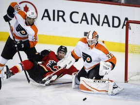 Goaltender Brian Elliott of the Philadelphia Flyers made a successful return to Calgary with 43 saves in a 5-2 victory over the Flames in NHL action Monday night at the Scotiabank Saddledome. Elliott played last season in Calgary before signing as a free-agent with Philadelphia during the off-season.