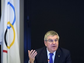 International Olympic Committee (IOC) president Thomas Bach from Germany speaks prior to the opening of the first day of the executive board meeting of the International Olympic Committee (IOC) at the IOC headquarters, in Pully near Lausanne, on Tuesday, Dec. 5, 2017. The IOC executive board is meeting to decide if Russian athletes can compete at the upcoming Pyeongchang Olympics despite evidence that the country ran an orchestrated doping program at the 2014 Sochi Games.