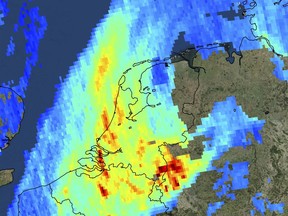 Image released by European Space Agency ESA on Friday, Dec. 1, 2017 shows high levels of atmospheric nitrogen dioxide over the Netherlands and the Ruhr area in west Germany taken by Copernicus Sentinel-5P on Nov. 7, 2017. Sentinel-5P is the first Copernicus mission dedicated to monitoring our atmosphere. (KNMI/ESA via AP)
