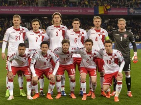 FILE - In this Sunday, March 26, 2017 filer, Denmark's national soccer team poses for a photograph prior to their World Cup Group E qualifying soccer match against Romania, at the Cluj Arena stadium in Cluj, Romania. (AP Photo/Andreea Alexandru, File)