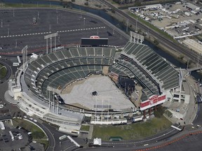FILE - This Feb. 5, 2016, file photo shows the Oakland–Alameda County Coliseum, home to the Oakland Athletics, in Oakland, Calif. The Athletics are left to consider yet another site to build a new ballpark after the team's top choice of location near Laney College fell through with the board of Peralta Community College District. A's President Dave Kaval and his team had considered this the top spot and had engaged in conversations with community members, officials and business owners in the area in hopes of building a privately financed ballpark to open as soon as 2023.