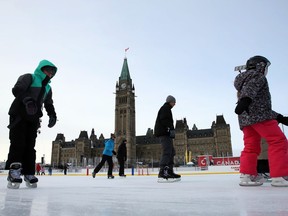 Skaters brave brave the extreme cold weather conditions on the Canada 150 skating rink on Parliament Hill in Ottawa, Friday, December 29, 2017.