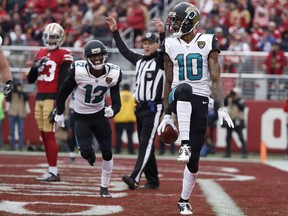 Jacksonville Jaguars wide receiver Jaelen Strong celebrates after scoring a touchdown against the San Francisco 49ers during the first half of an NFL football game in Santa Clara, Calif., Sunday, Dec. 24, 2017.